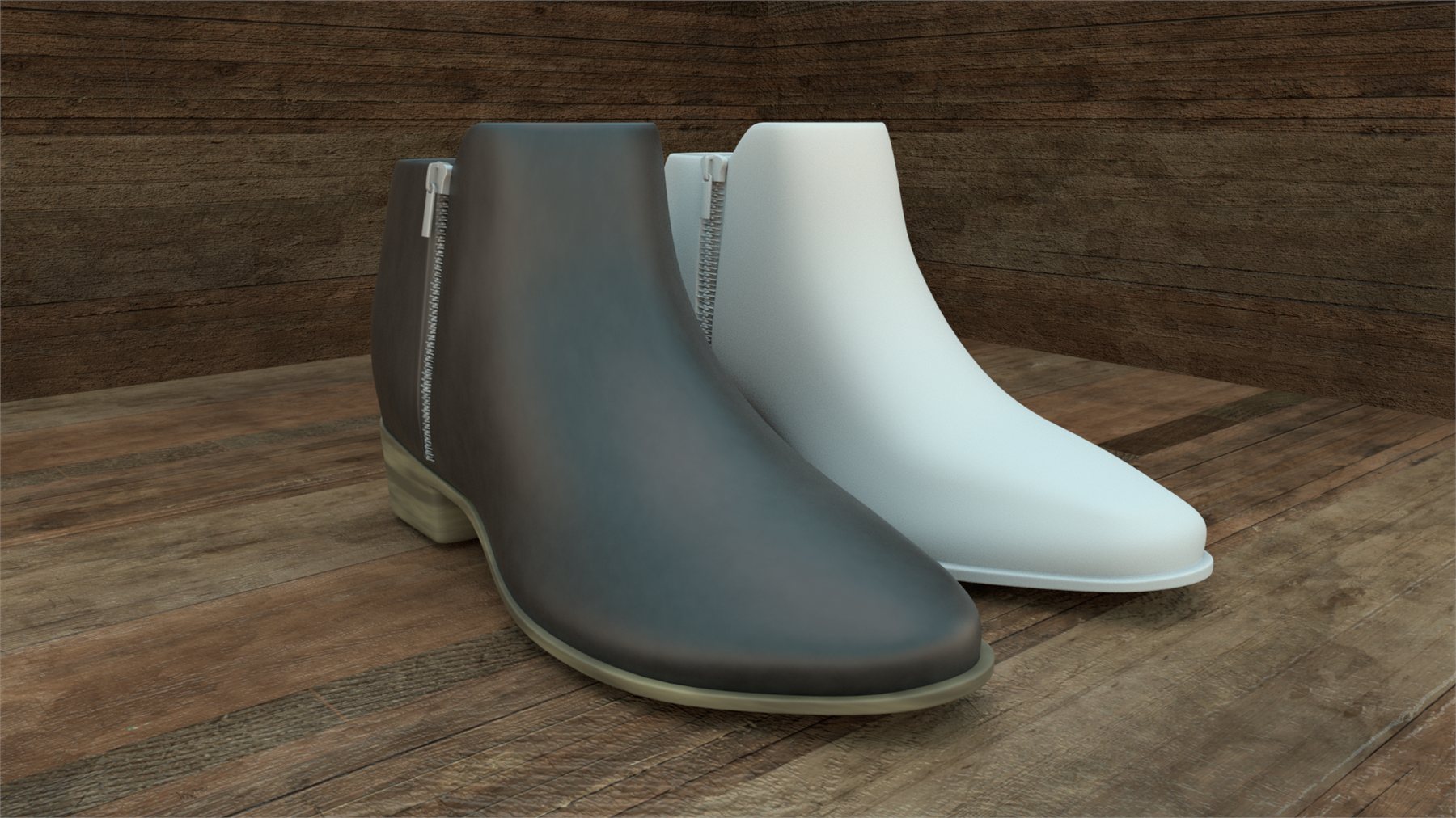 Two leather ankle boots on a wooden floor