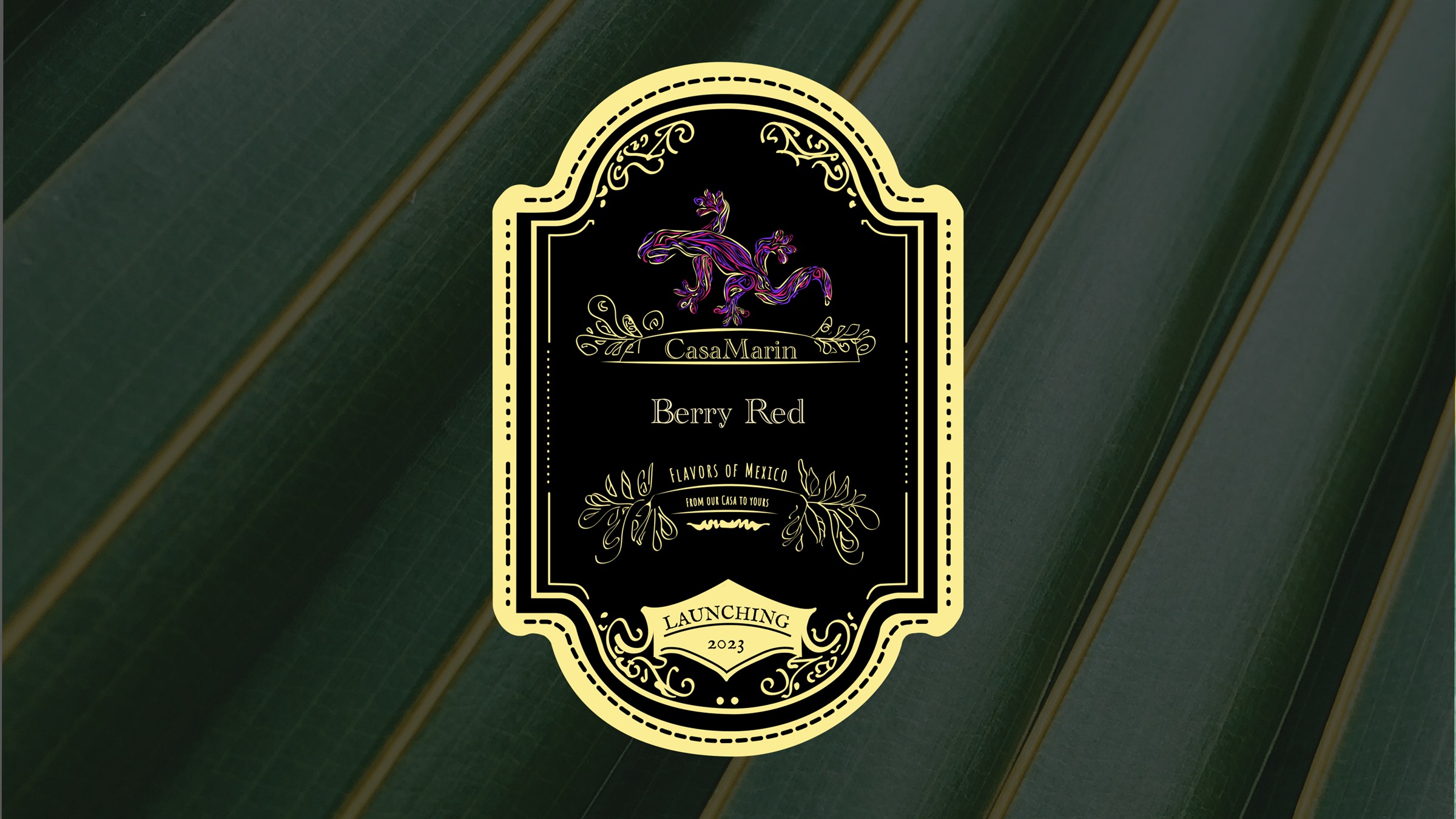 Berry Red front label, engraved frame and hand-drawn gecko, on a dark green ground